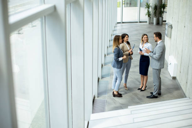 istock Young startup team have a discussion by stairs in the office corridor 1500626445