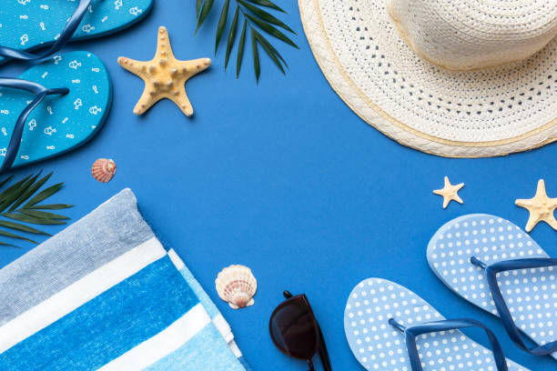 istock Summer vacation concept flat lay. straw hat beach accessories and towel top view. Space for text. travel concept 1500627560