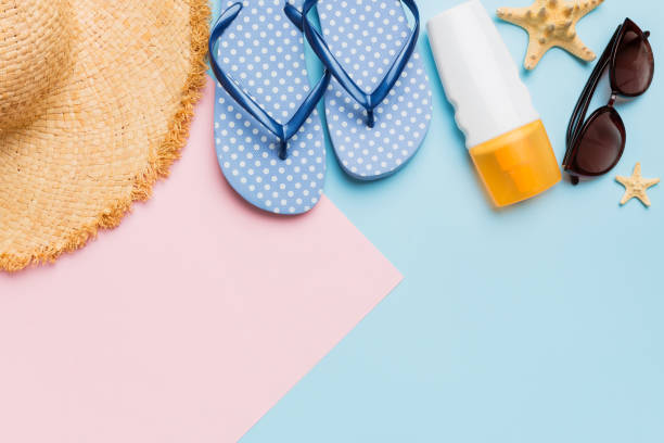 istock Summer vacation concept flat lay. straw hat beach accessories and flip flop top view. Space for text. travel concept 1500627598