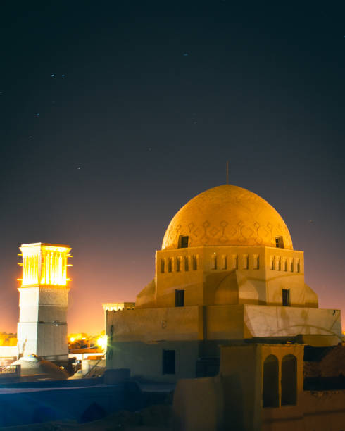istock Yazd rooftops panorama with starry night. Muslim architecture dome buildings and ar 1500629802