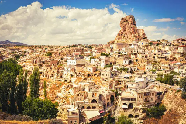 Ortahisar fortress in Cappadocia, popular tourist destination, front view with dynamic sky cloudscape static timelapse