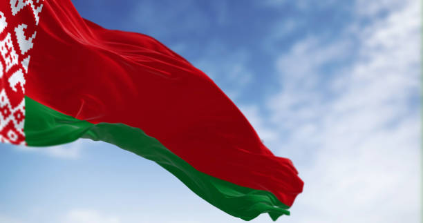 national flag of belarus waving in the wind - flag of belarus imagens e fotografias de stock