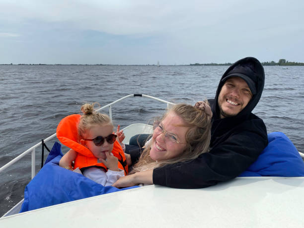istock Relaxing sailing young family 1500640149