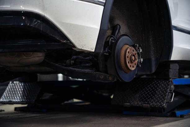istock SUV on the car lift in auto service, without wheels 1500641645