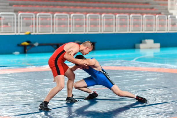 Penetration Shot Practiced By Wrestler During Match Penetration Shot Practiced By Wrestler During Match greco stock pictures, royalty-free photos & images