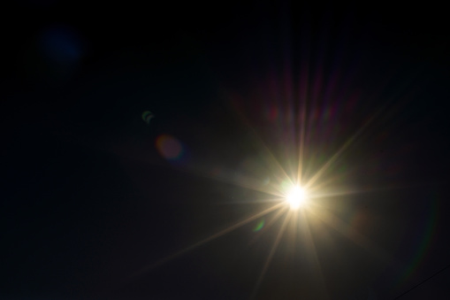 Real lens flare isolated on black background