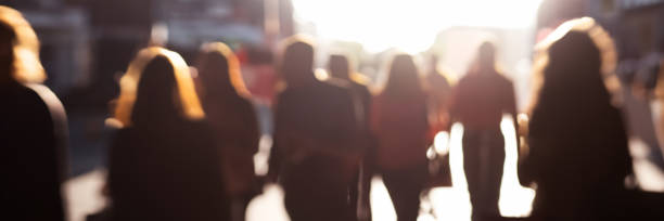 istock unrecognizable motion blurred people walking in the city 1500645407