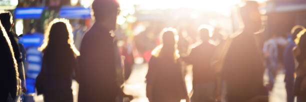 istock unrecognizable motion blurred people walking in the city 1500645422
