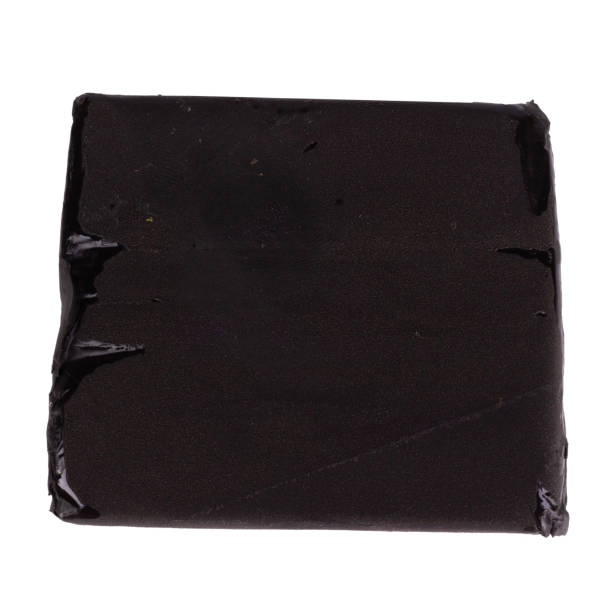 istock plasticine black lump isolated on white background 1500651807