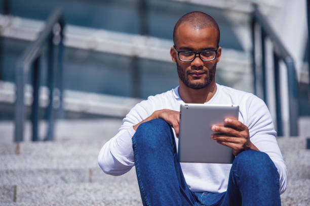 istock Businessman with gadget 1500653060