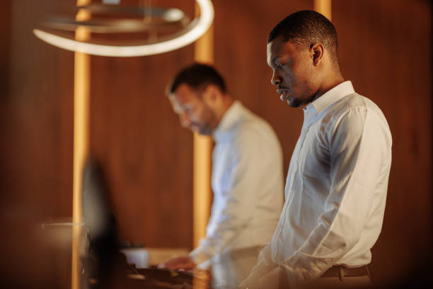 istock African-American hotel receptionist looking upset after reading negative feedback 1500653954