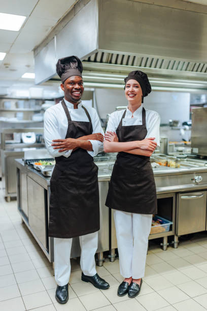 istock Portrait of two diverse chefs in kitchen 1500658244