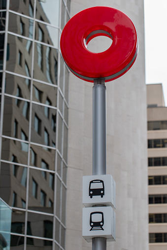 Ottawa, Canada - May 19, 2023: Red O Train, OC Transpo Light Rail Transit station sign in downtown of the city.
