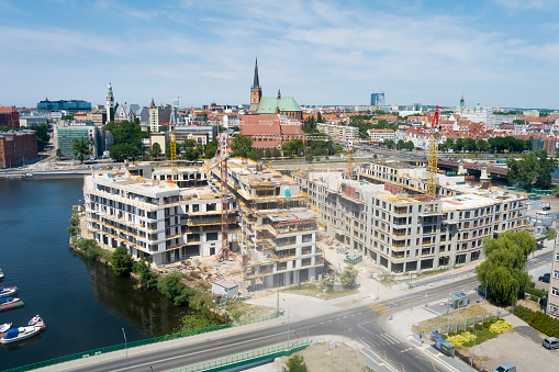 Aerial view of the Odra river with new housing estate under construction, Szczecin, Poland