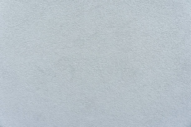 istock Captivating close-up of a wall adorned with elegant gray decorative stucco, adding a touch of sophistication to any space. 1500669810