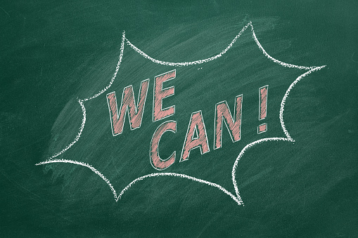 We Can. Business motivational inspirational quotes. Illustration hand drawn in chalk on greenboard. Positive thinking. Concept of ability, motivation, possibility, persistence