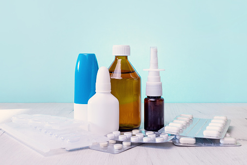 Medicine bottles, pills, health care concept.