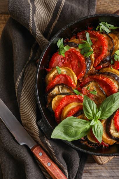 istock Delicious ratatouille and knife on table, flat lay 1500681307