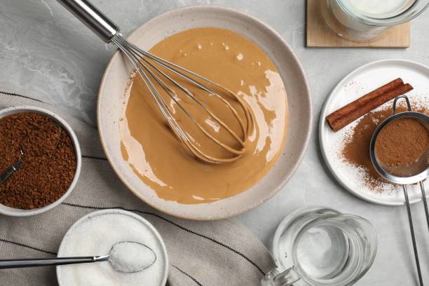 istock Whipping cream for dalgona coffee and ingredients on light gray table, flat lay 1500681330