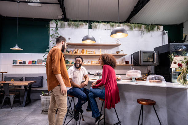 istock Friends talking in a coffee shop 1500682626