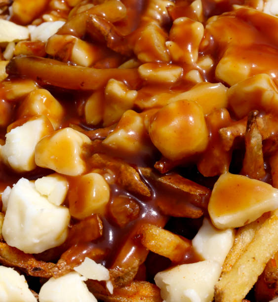 istock Close up of freshly made Poutine 1500682699