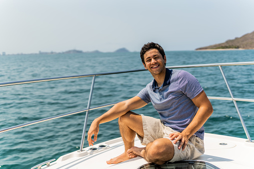 Portrait of young man during a yacht trip
