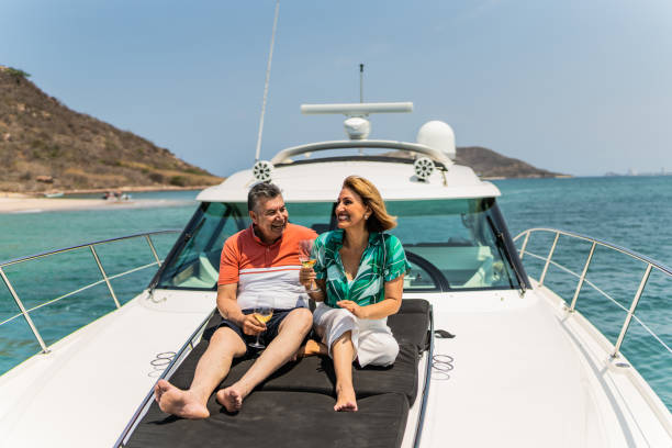 istock Senior couple drinking wine and talking during a yacht trip 1500688002