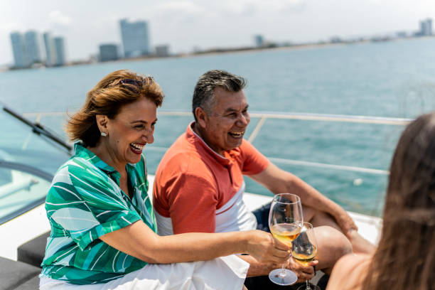 istock Family drinking wine and talking during a yacht trip 1500688820