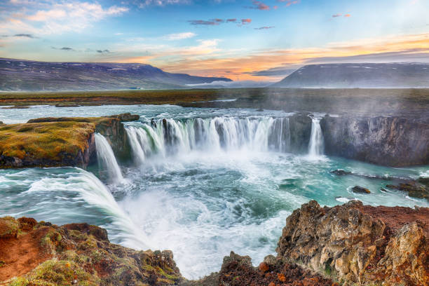 istock Breathtaking sunset scene of powerful Godafoss waterfall. Dramatic sky over Godafoss. 1500690781