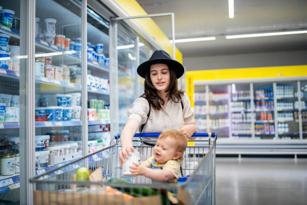 istock Young mother shopping with her baby son. 1500715839
