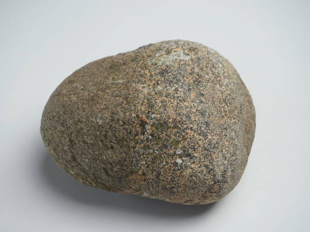 istock Large stone on white background, close-up, macro photography. 1500727753