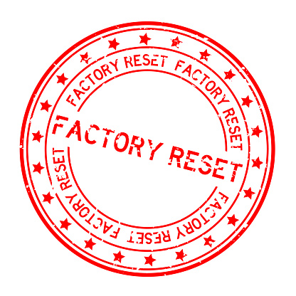 Grunge red factory reset word with star icon round rubber seal stamp on white background