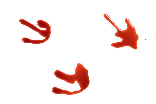 istock closeup drops of red blood isolated on white background,abstract pattern 1500738777