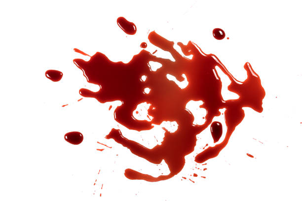 istock closeup drops of red blood isolated on white background,abstract pattern 1500739129