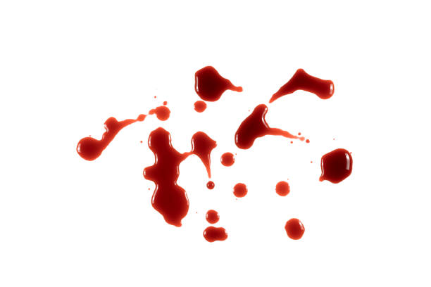 istock closeup drops of red blood isolated on white background,abstract pattern 1500741052