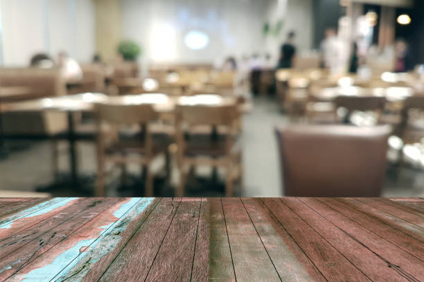 istock Top desk with blur restaurant background,wooden table 1500741166