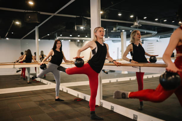 istock female exercise on the barre class in LA 1500741568