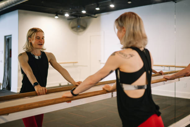 istock woman exercising on the barre class in LA 1500744161