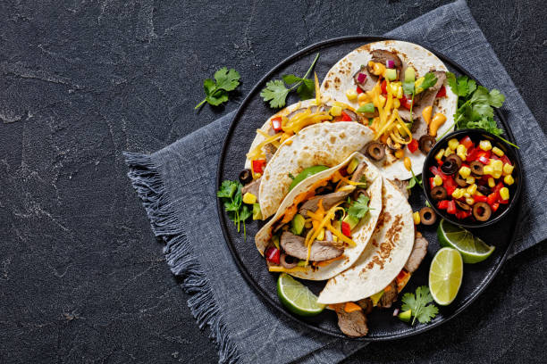 istock Beef Steak Tacos with veggies, avocado, corn 1500744447