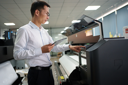 Technician keeps smart printer running smoothly