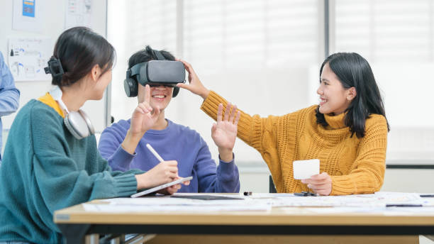 istock Team of developer discussing new ideas to improve the visual experience, working on virtual reality applications in modern office. 1500750201