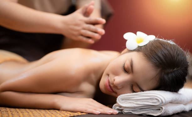 istock Young Beautiful Woman relaxing massage 1500752879