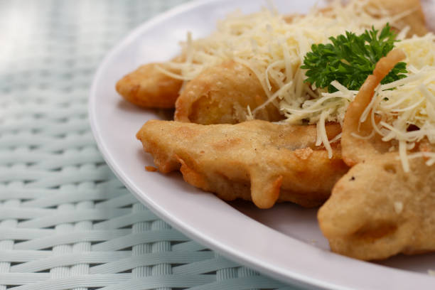 istock fried banana with grated cheese. copy space. 1500760434