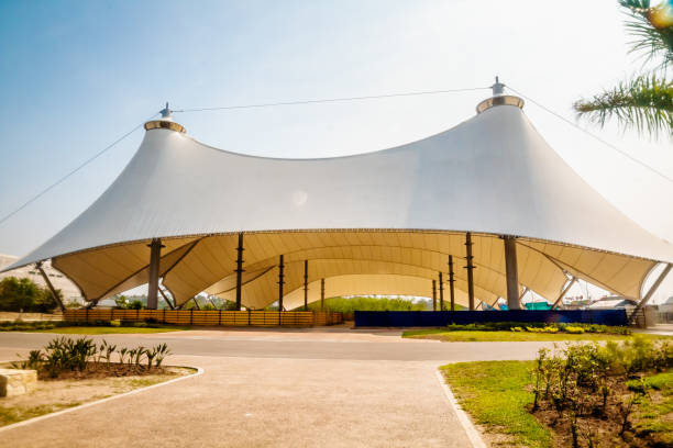 White tent with pens for cattle Carpa blanca con corrales para ganado bovino en feria cattle pen stock pictures, royalty-free photos & images