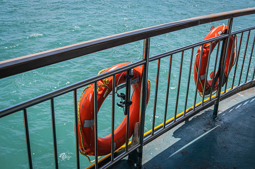 Life buoy on the deck of cruise ship.