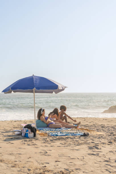 istock Relaxed friends on their beach vacation 1500764561