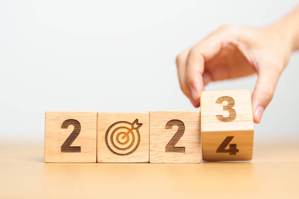 istock 2023 year change to 2024 year block with dartboard icon. Goal, Target, Resolution, strategy, plan, Action, mission, motivation, and New Year start concepts 1500766151