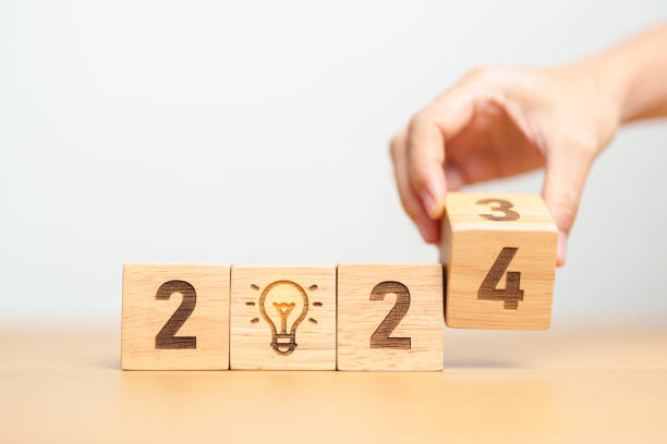 istock 2024 block with lightbulb. Business Idea, Creative, Thinking, brainstorm, Goal, Resolution, strategy, plan, Action, change and New Year start concepts 1500766163