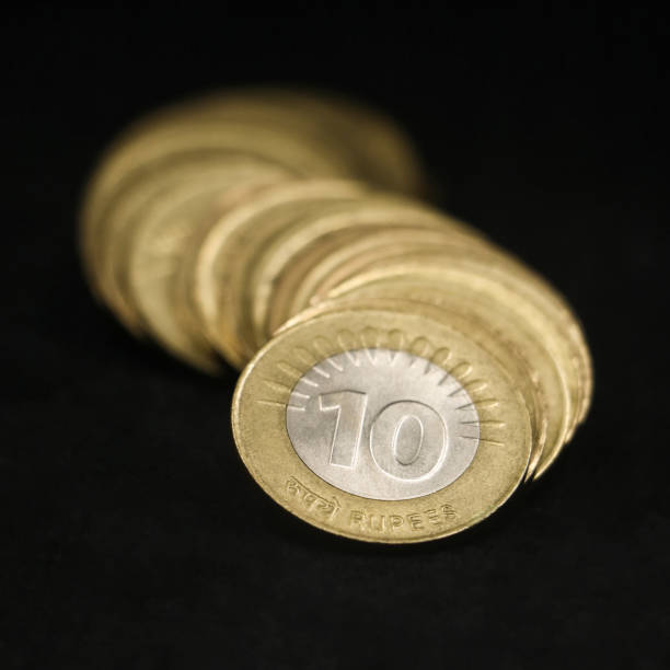 istock indian ten (10) rupee coins arranged in a curved row 1500768796