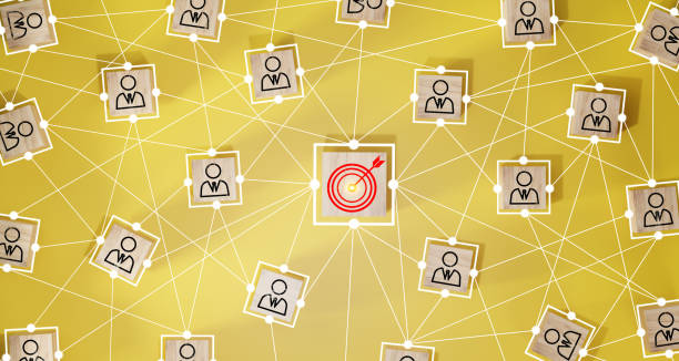 istock Red dartboard and red arrow connection linkage with human icon for customer focus target group and customer relation management concept. 1500783763